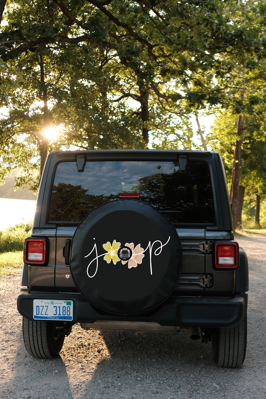 Warehouse Sale - Discounted Floral Jeep Tire Cover for Backup Camera